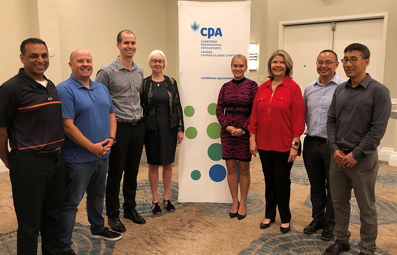 a group of men and women at CPA Canada and CIIPA event